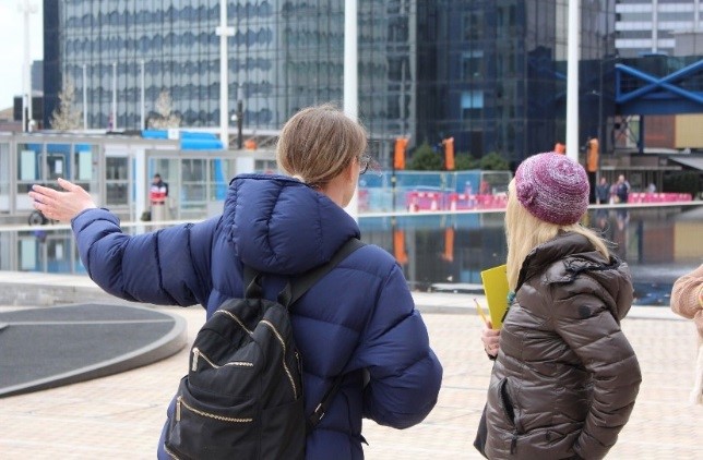 Roundhouse staff member and tour guide volunteer in Centenary Square during volunteer guide training