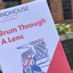 Picture of the Brum Through A Lens leaflet with the Roundhouse in the background