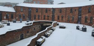Image of Roundhouse Birmingham covered in snow.